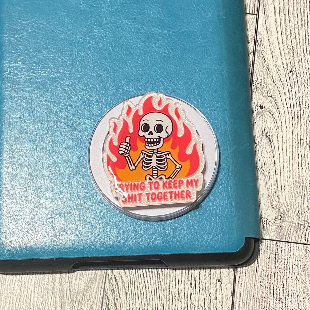 Sticker with a skeleton design on a blue surface