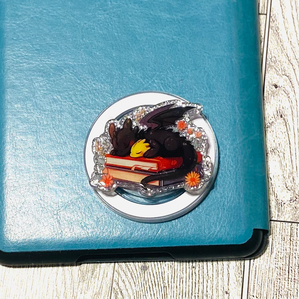 Black and gold dragon laying on books E-Reader, Phone Grip for all Devices Magnetic Grip