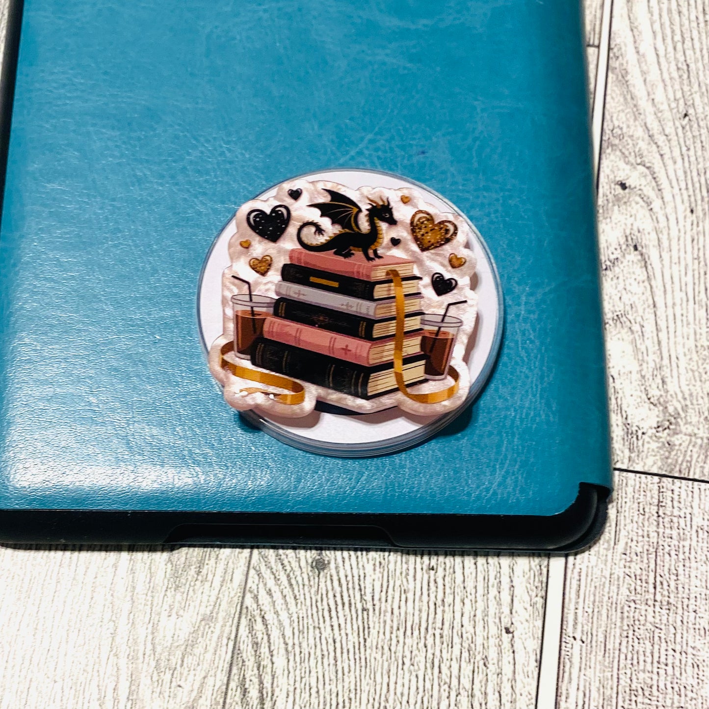 Stacked books with Dragon and coffee, pink Magnetic Grip