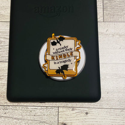 Magnetic e-reader phone grip with decorative design