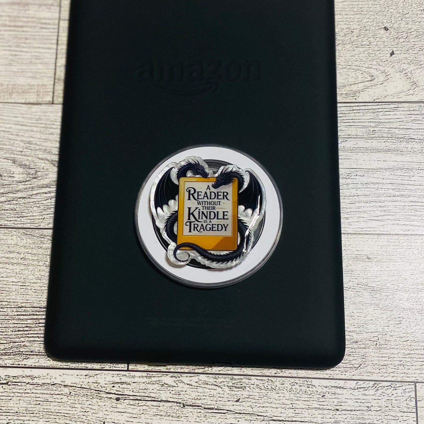 Magnetic e-reader phone grip with dragon design 