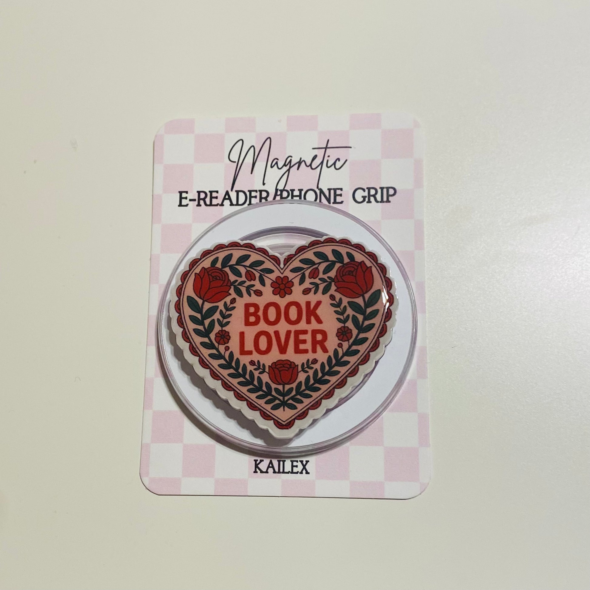 Heart-shaped 'Book Lover' grip on a checkered card with 'KAILEX' branding