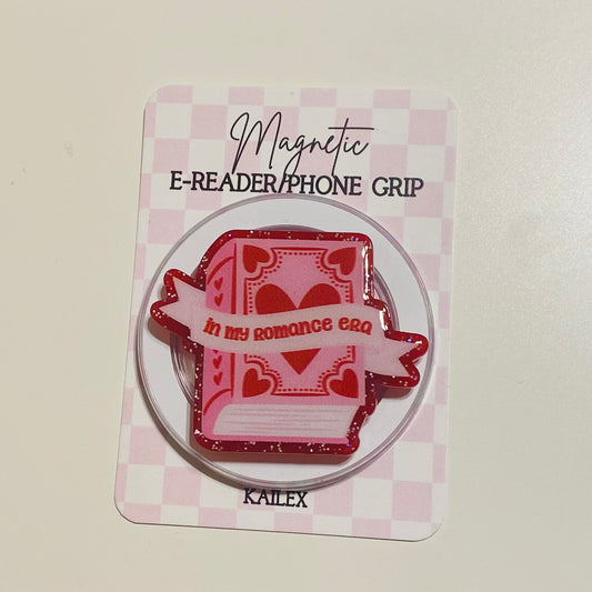 Magnetic e-reader/phone grip with red heart design on a checkered card