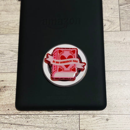 Magnetic e-reader/phone grip with red heart design 
