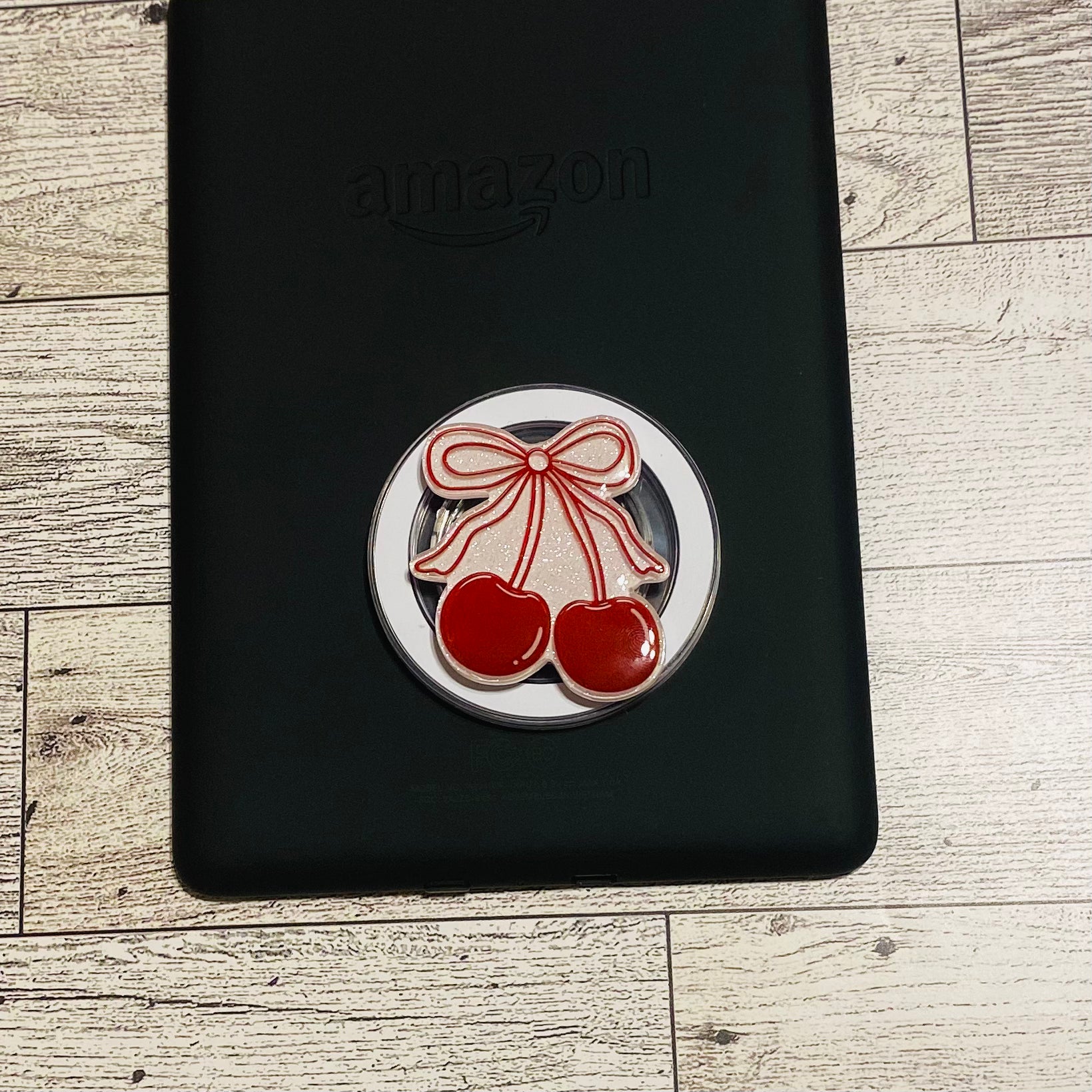 Magnetic e-reader phone grip with cherry design 