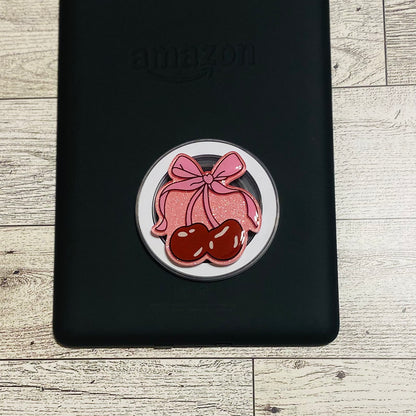 Magnetic e-reader phone grip with pink bow and cherries