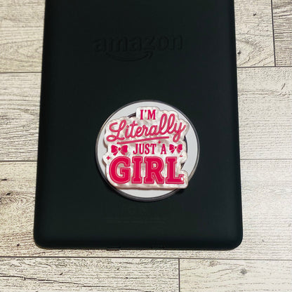 Magnetic e-reader/phone grip with 'I'm Literally Just a Girl' text 