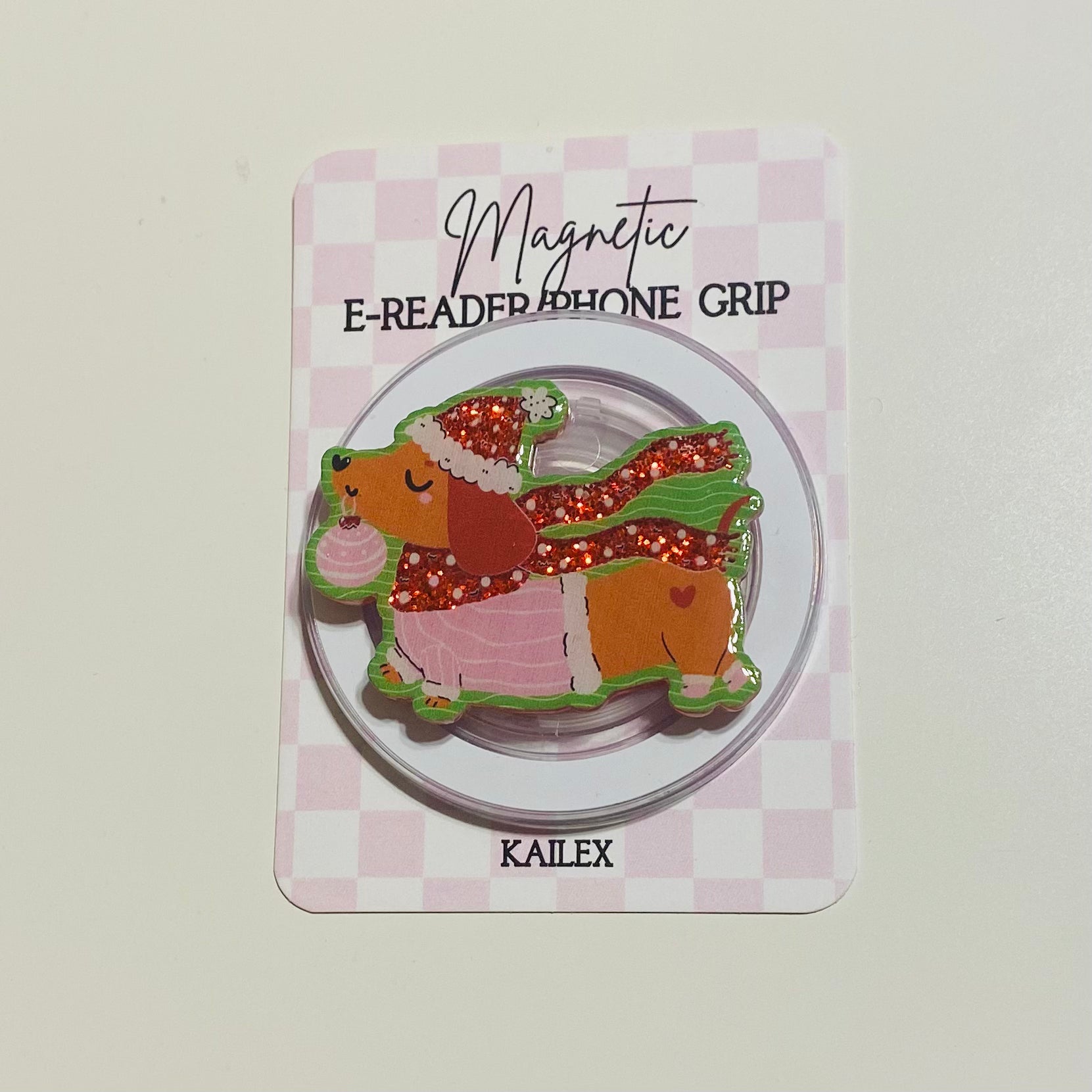 Magnetic e-reader phone grip with dog design on a checkered card, brand 'KAILEX' visible