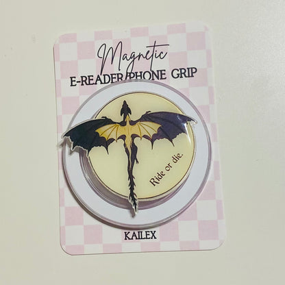 Magnetic e-reader phone grip with dragon design on a checkered background