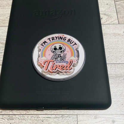 Magnetic e-reader phone grip with cartoon character and text