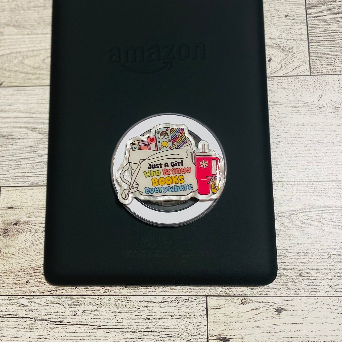 Magnetic e-reader phone grip with 'Just a Girl Who Reads Books' design