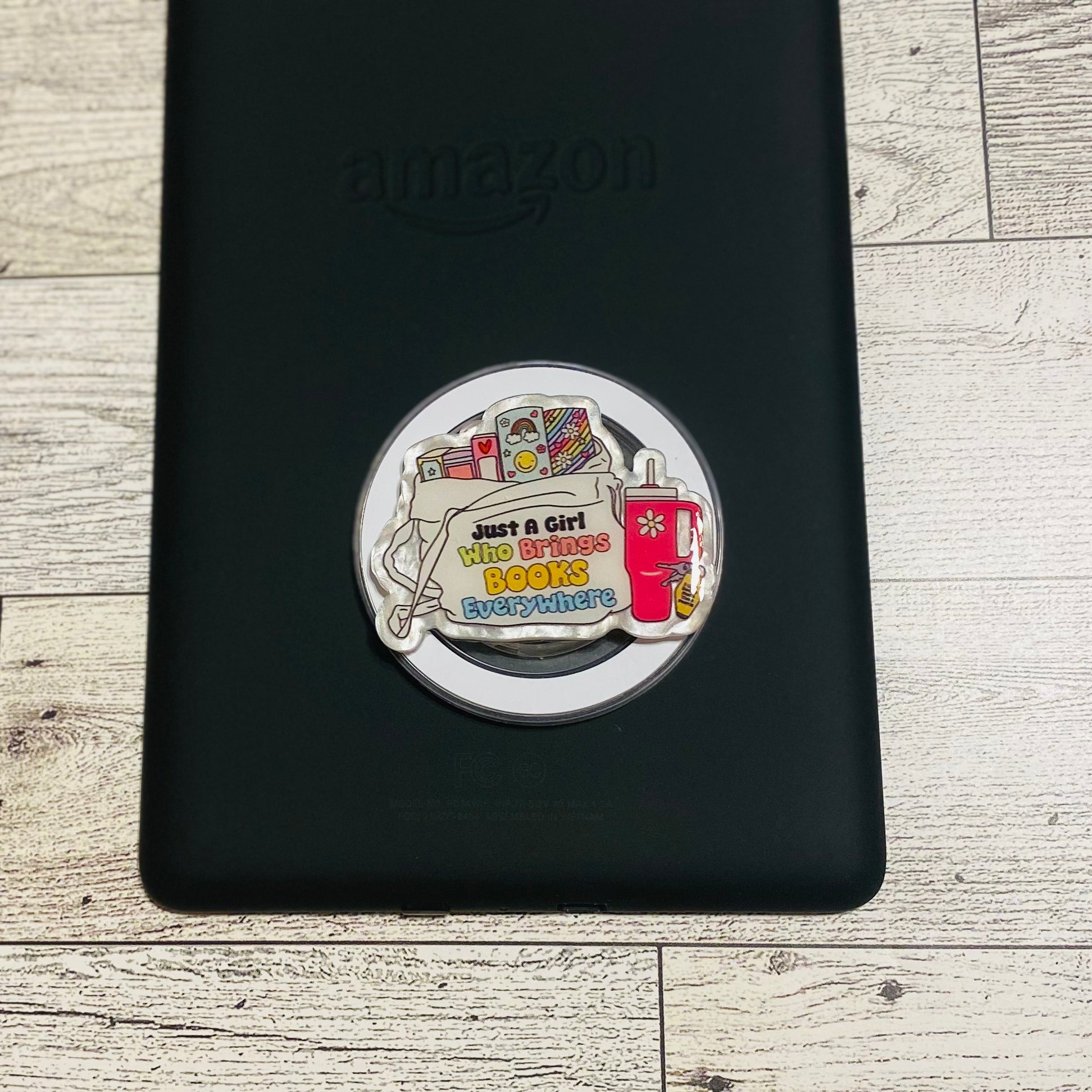 Magnetic e-reader phone grip with 'Just a Girl Who Reads Books' design