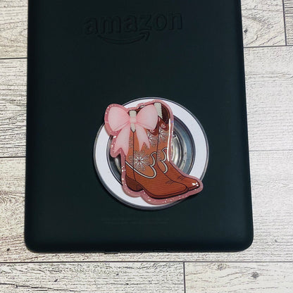 Magnetic e-reader phone grip with cowboy boot design