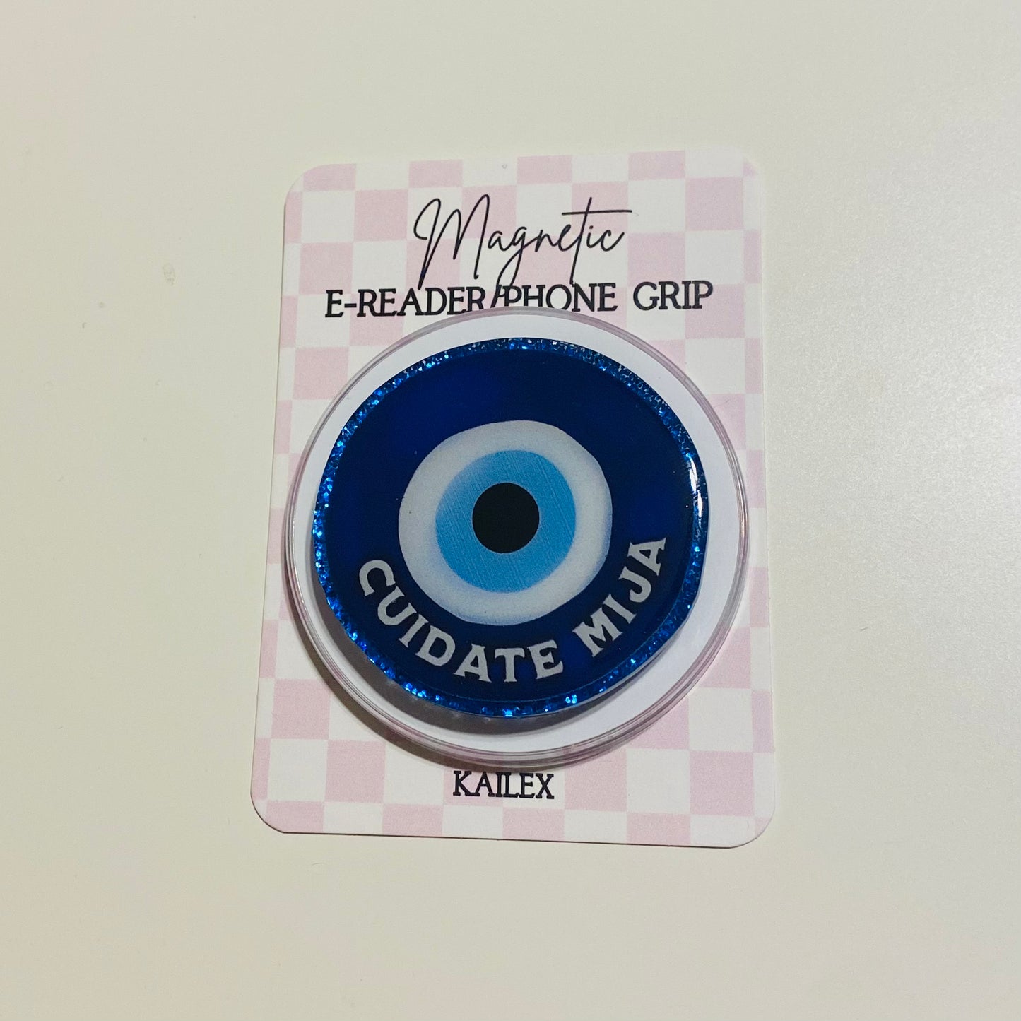Blue Ojo eye with saying cuidate mija