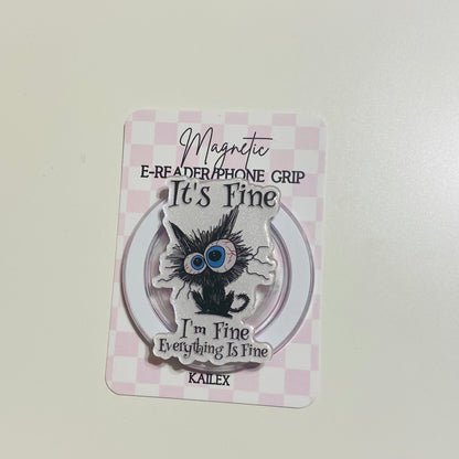 Magnetic e-reader phone grip with cartoon cat design on a pink checkered card
