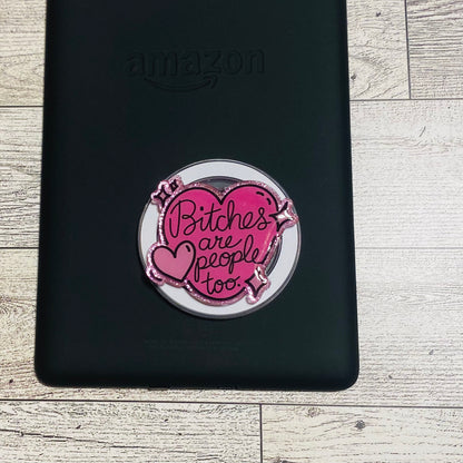 Pink magnetic e-reader phone grip with text 
