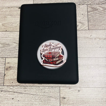 Magnetic e-reader phone grip with 'Books are my love language' design