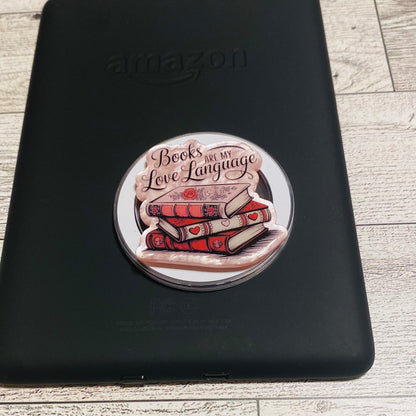 Magnetic e-reader phone grip with 'Books are my love language' design