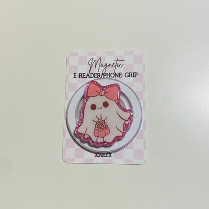 Magnetic e-reader/phone grip with cartoon character on a checkered card