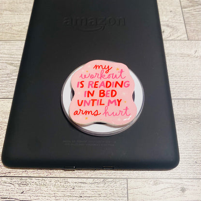 Magnetic e-reader/phone grip with pink design and text 