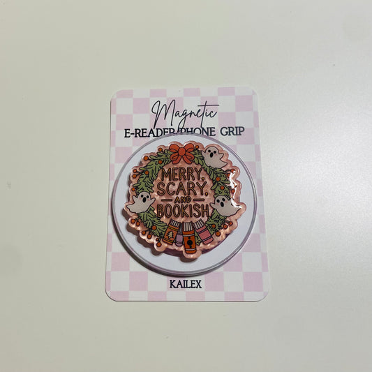 Merry Scary and Bookish magnetic e-reader phone grip on a checkered card with KALEX branding.