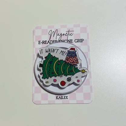 Magnetic e-reader phone grip with Christmas tree design on a checkered card