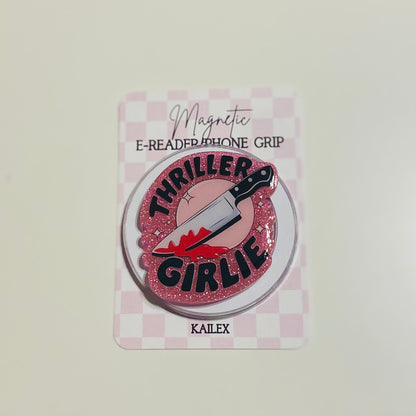 Pink glittery phone grip with 'Thriller Girlie' design on a checkered card, brand 'KAILEX' visible.