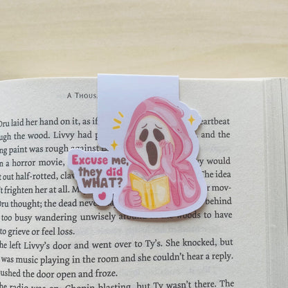 Excuse me, they did what? pink ghost reading yellow book Magnetic Bookmark