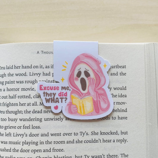 Excuse me, they did what? pink ghost reading yellow book Magnetic Bookmark