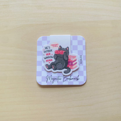 He's outside her window again black cat with pink books Magnetic Bookmark