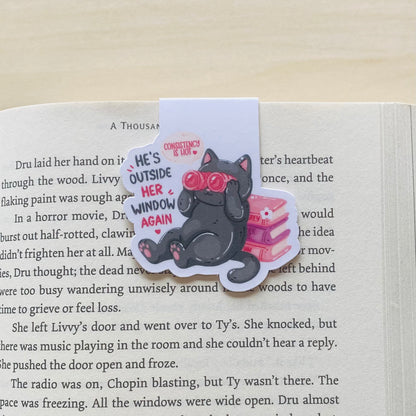 He's outside her window again black cat with pink books Magnetic Bookmark