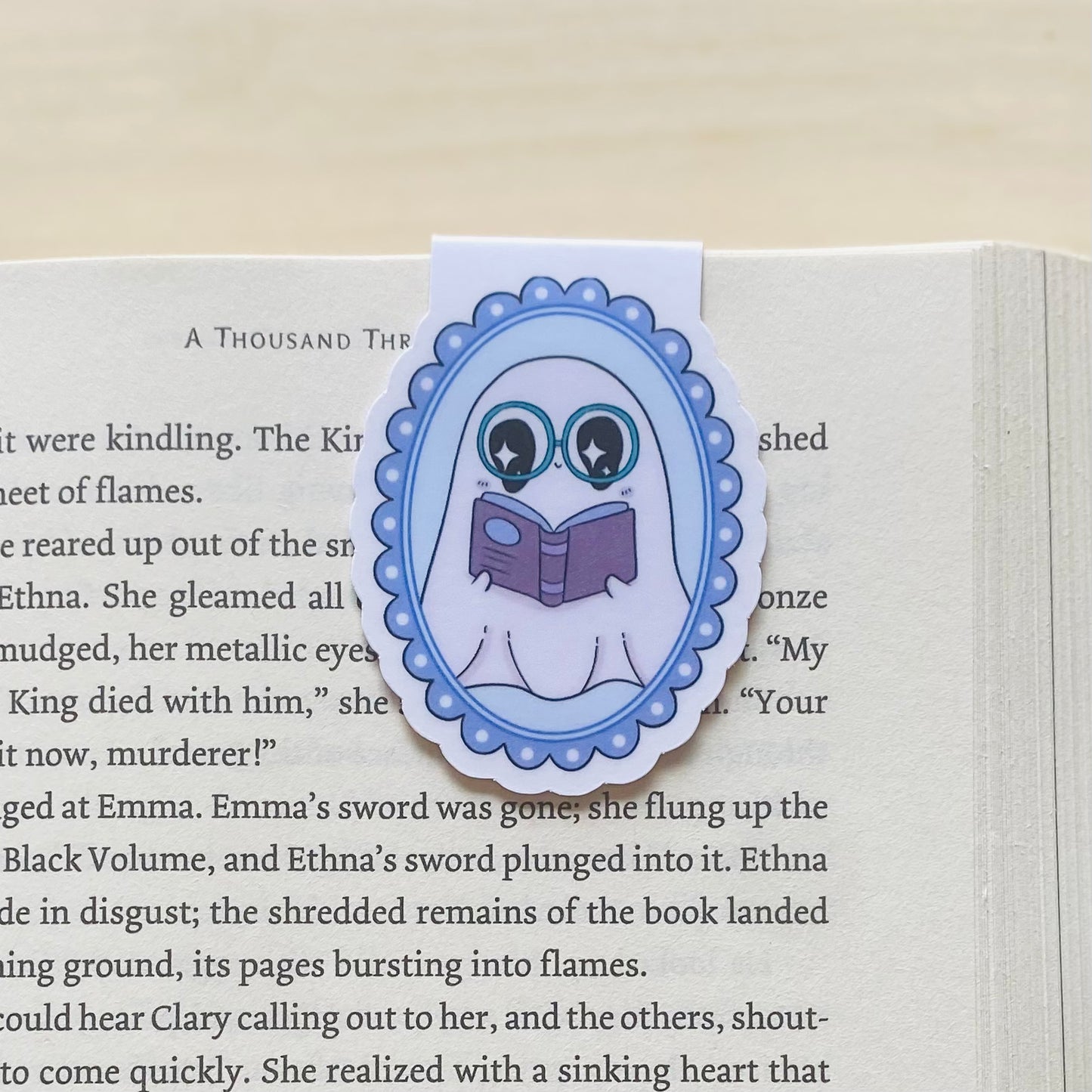 Purple ghost reading a book in purple frame Magnetic Bookmark