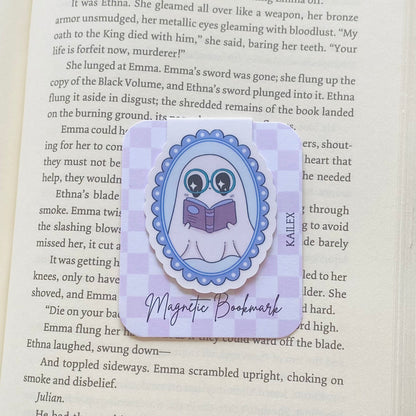 Purple ghost reading a book in purple frame Magnetic Bookmark