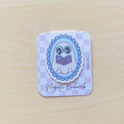 Purple ghost reading a book in purple frame Magnetic Bookmark