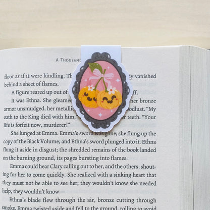 Cute pumpkin cherries in black and pink frame Magnetic Bookmark