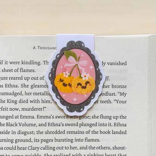 Cute pumpkin cherries in black and pink frame Magnetic Bookmark