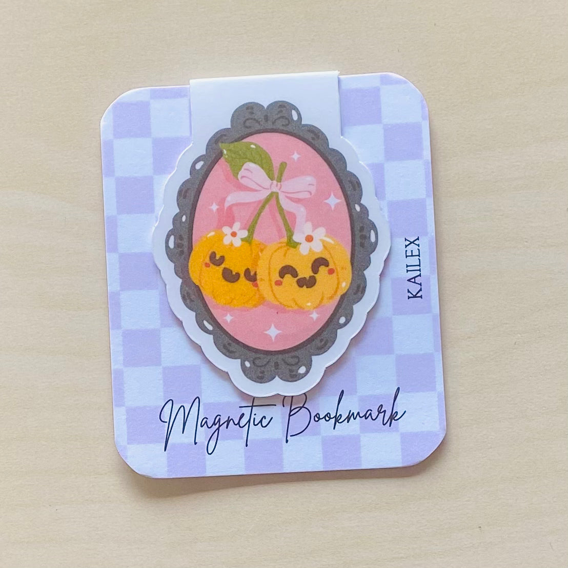 Cute pumpkin cherries in black and pink frame Magnetic Bookmark